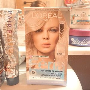 Multiple different bleach blonde hair dyes and one Carmel colored beige